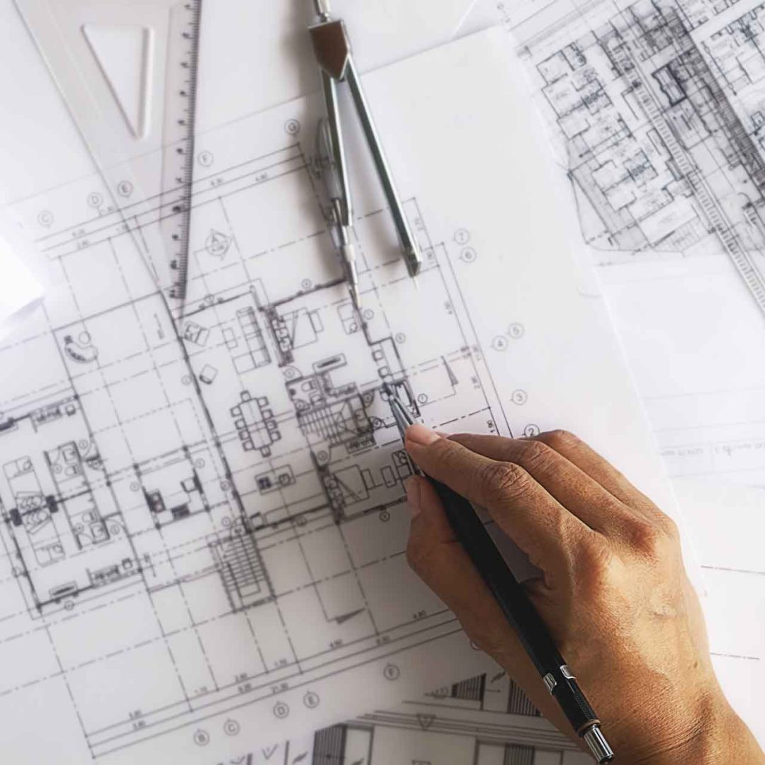 hands-engineer-working-blueprint-construction-concept-engineering-tools-vintage-tone-retro-filter-effect-soft-focus-selective-focus